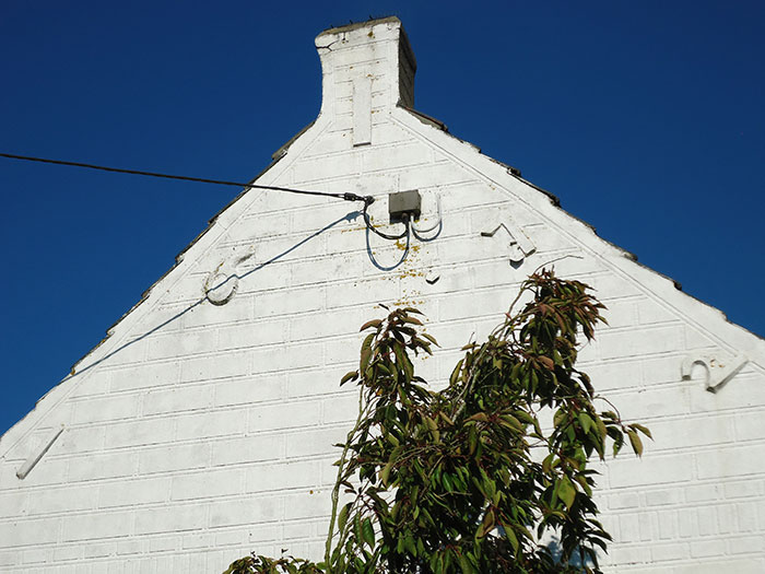 Side wall of the miller's house with inscription of the date 1672