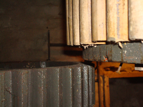 Wooden cogs of the track wheel and cast iron spur wheel (detail)